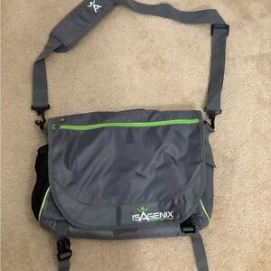 Gray and Green Messenger Bag with Adjustable Strap and Water-Resistant Fabric